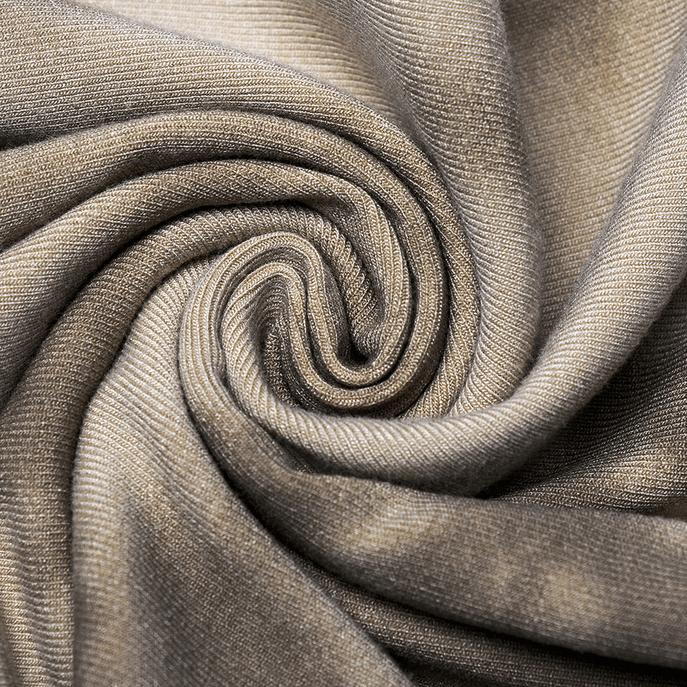 Close-up of a soft, stretchy knit fabric showcasing a stylish swirl pattern in a trendy tie-dye grey tone.