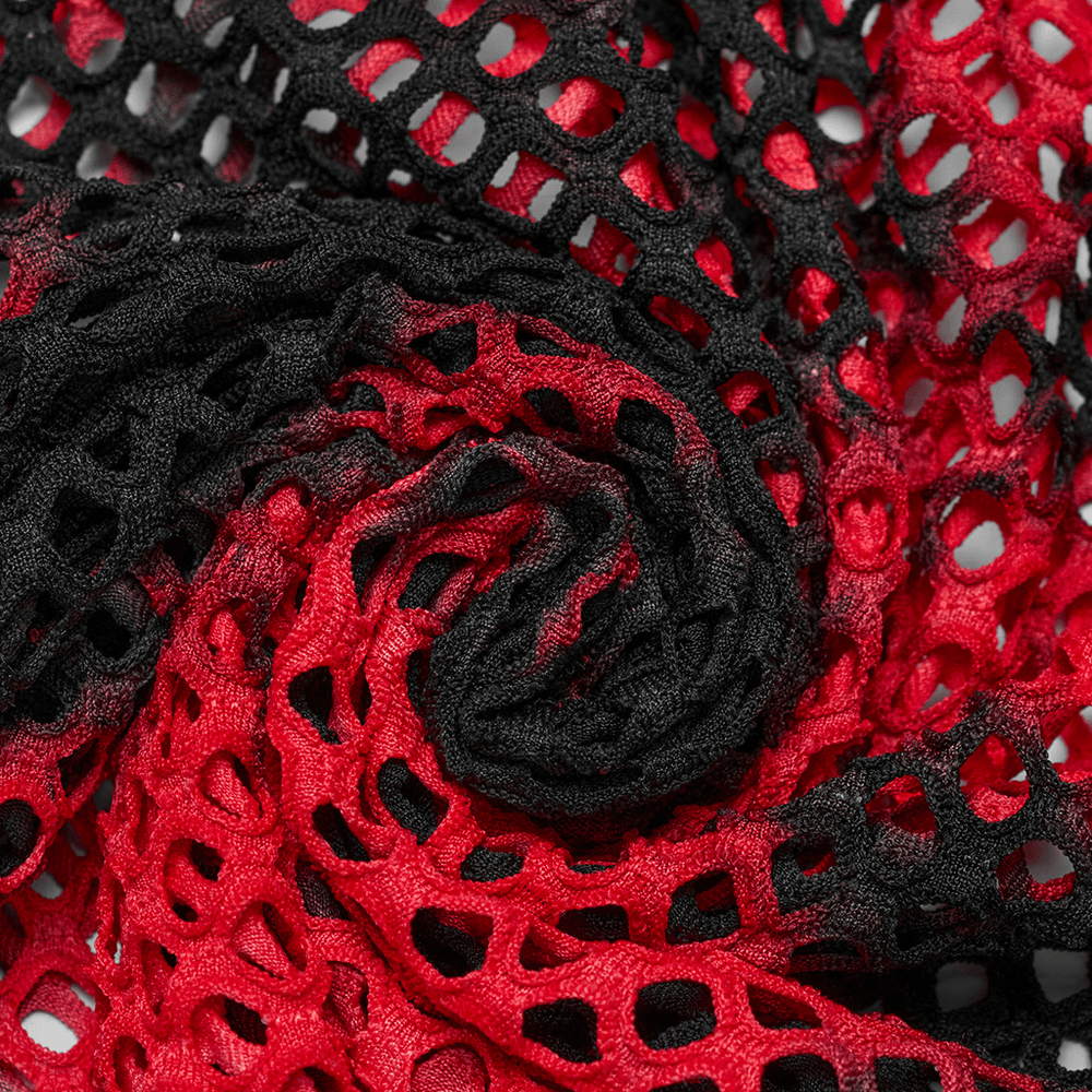 Close-up of trendy black and red mesh fabric, showcasing a punk tie-dye texture and edgy design elements.