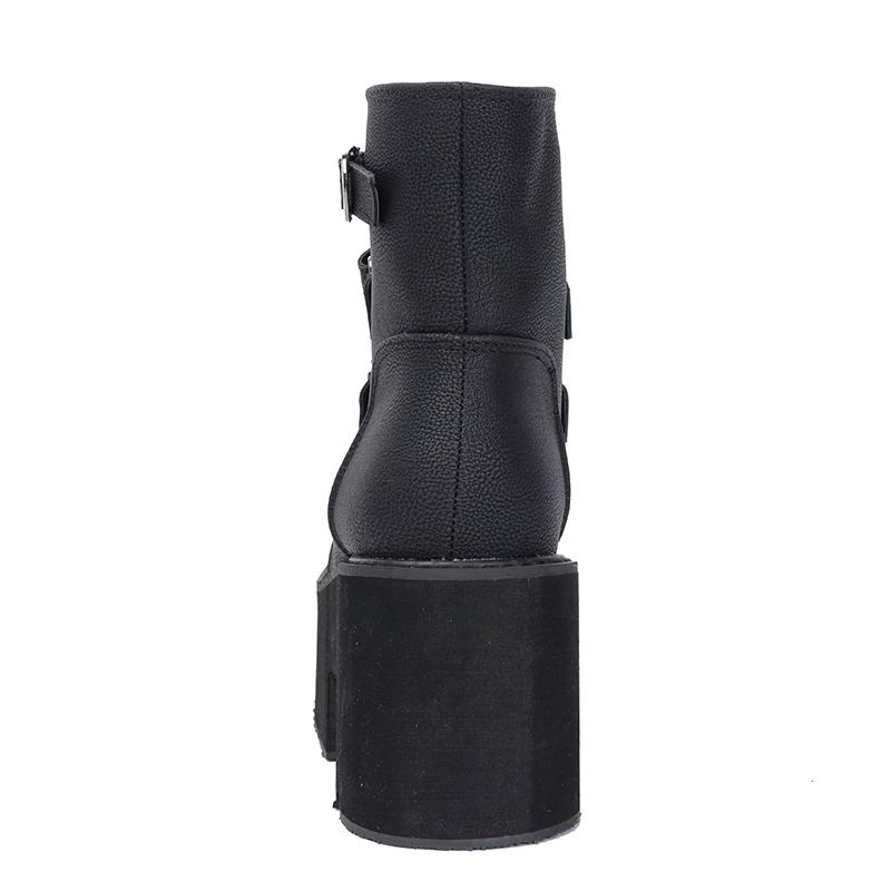 Trendy black leather women's ankle boots with platform and buckle detail, perfect for casual outfits.