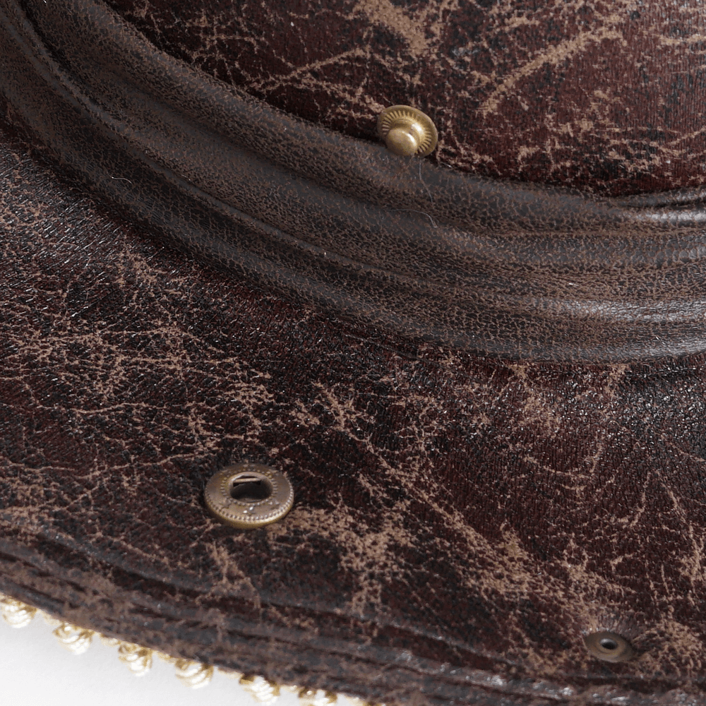 Close-up of a vintage-style tricorn hat featuring intricate detailing and gold accents.