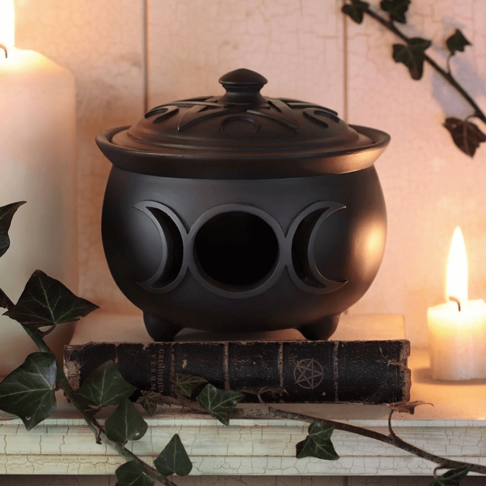 Triple Moon black cauldron trinket box with lid, perfect for mystical jewelry and altar storage.