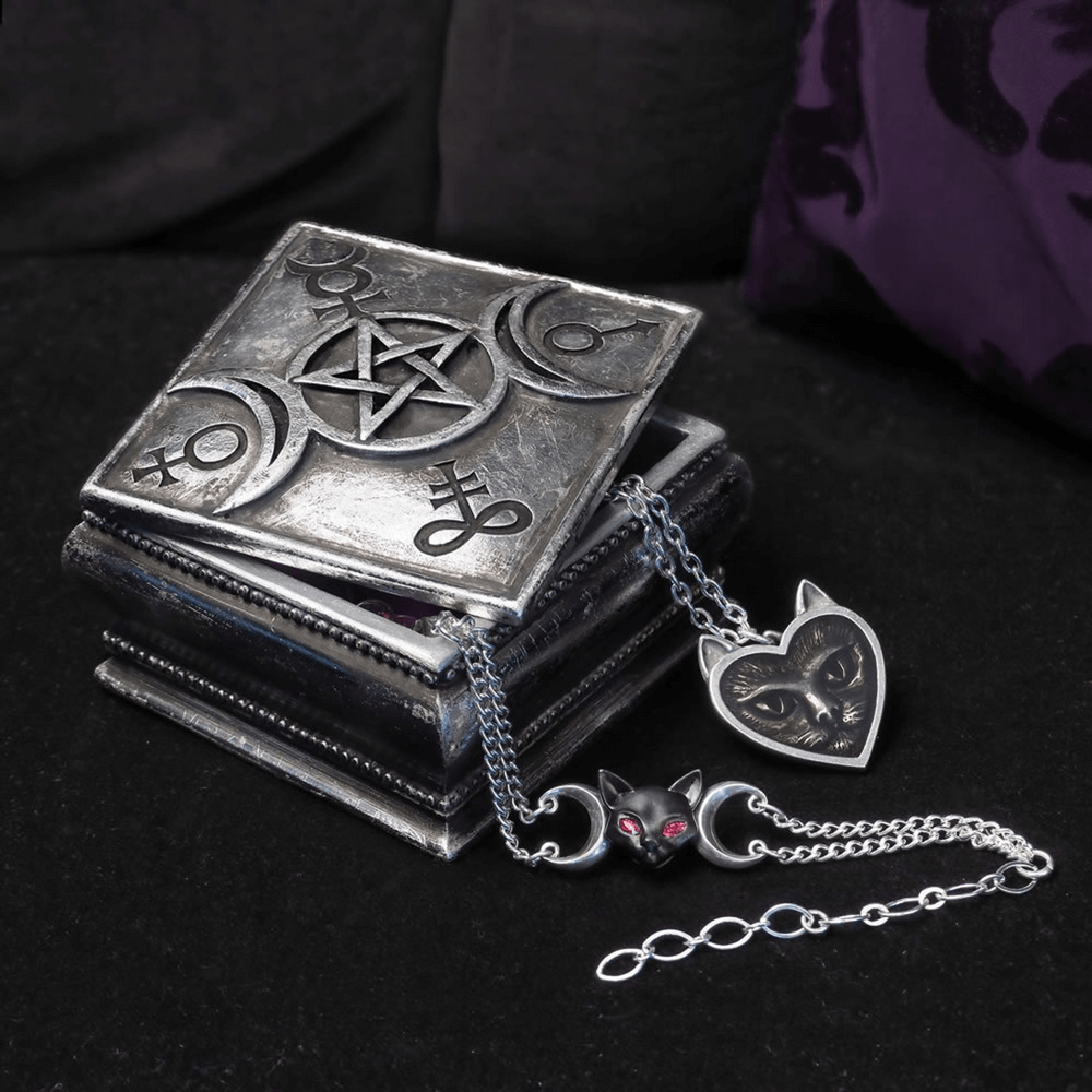 Triple moon witchcraft trinket box with pentacle design, perfect for storing magical charms and crystals.