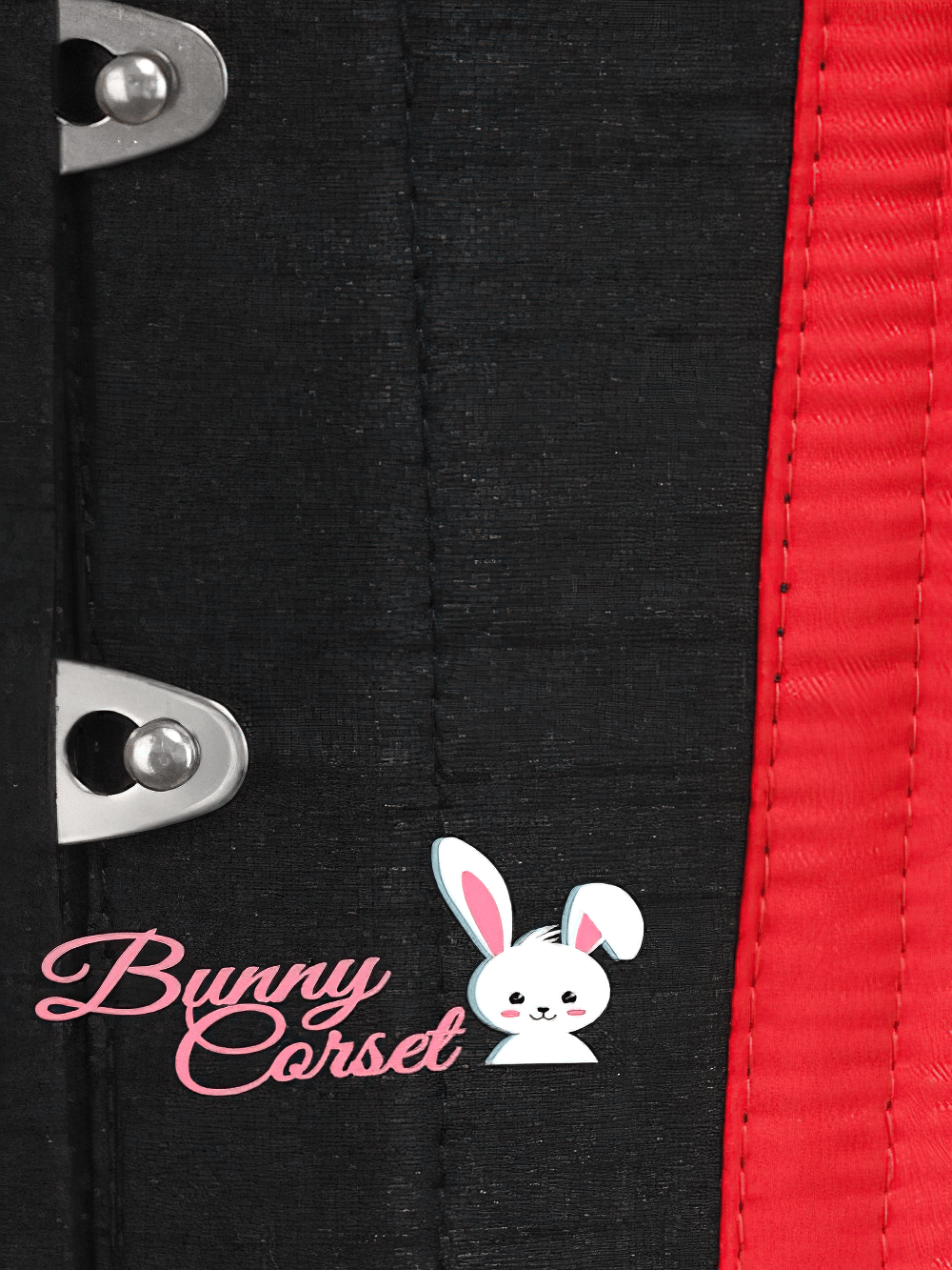 Close-up of a black and red underbust corset showcasing metal busk and stitching details, perfect for waist training.