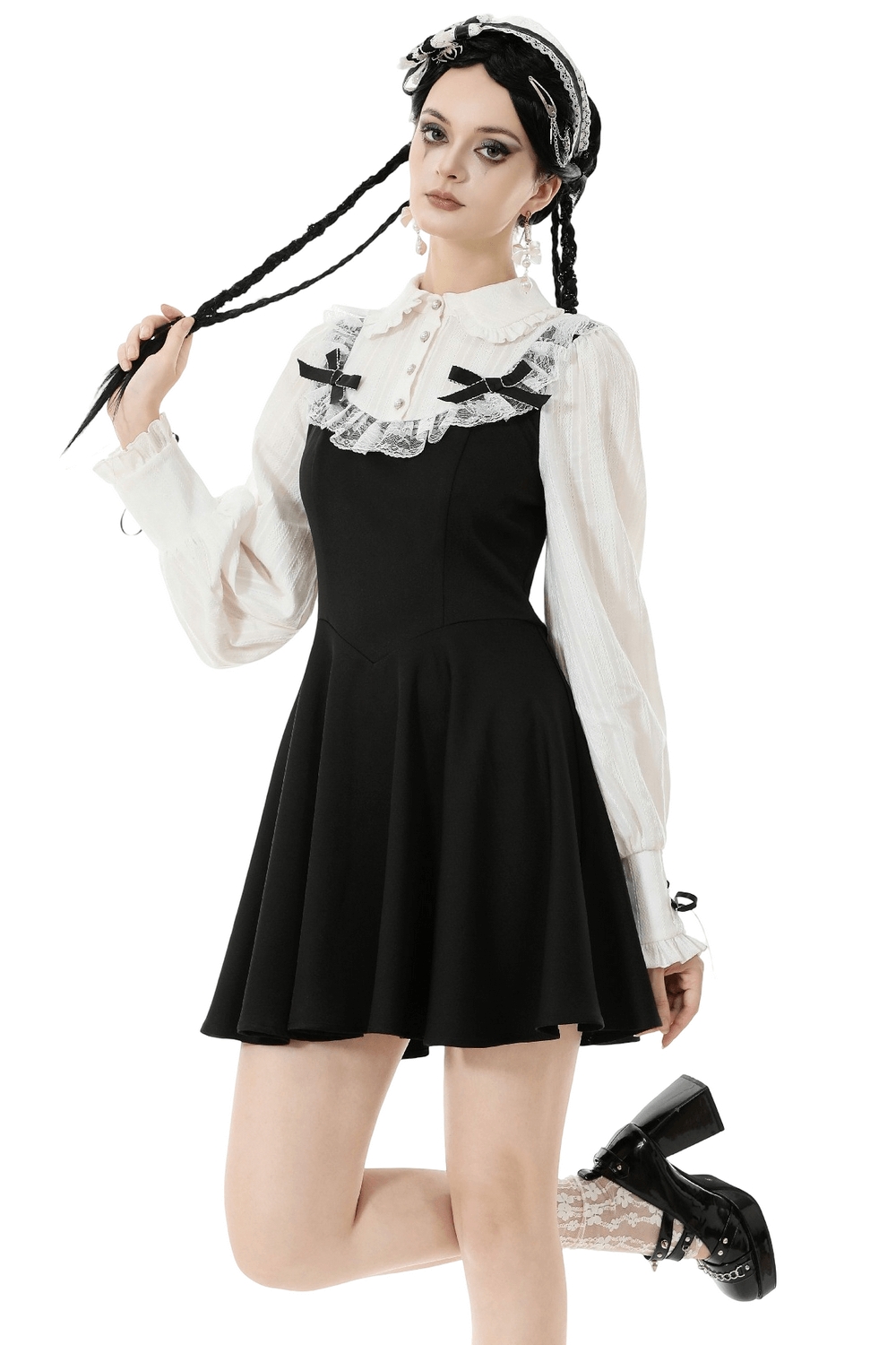 Unique Black and White Dress with Lace Collar and Bows worn by model with pigtails