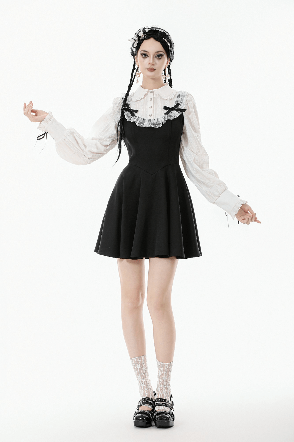 Unique Black and White Dress with Lace Collar and Bows on a model showcasing gothic style elegance.