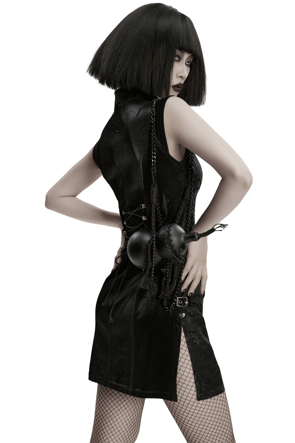 Unique Black Crossbody Mini Bag with Chains and Tassels worn stylishly with a gothic outfit.