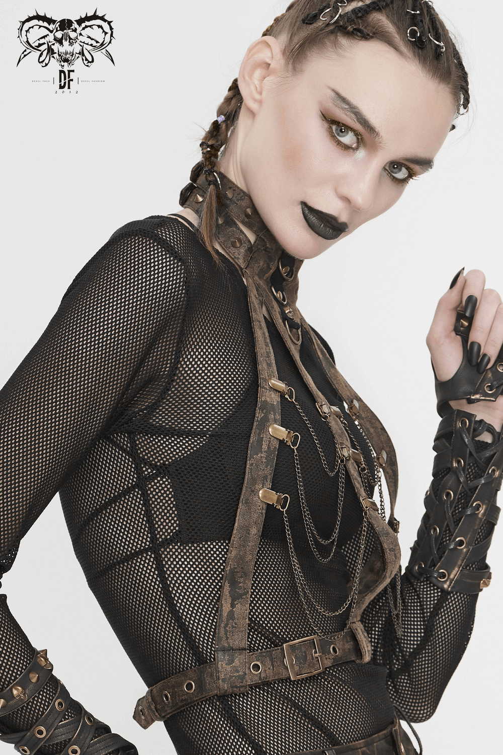 Unique Gothic body harness with metal chains worn by a model, showcasing vintage style and elegance.