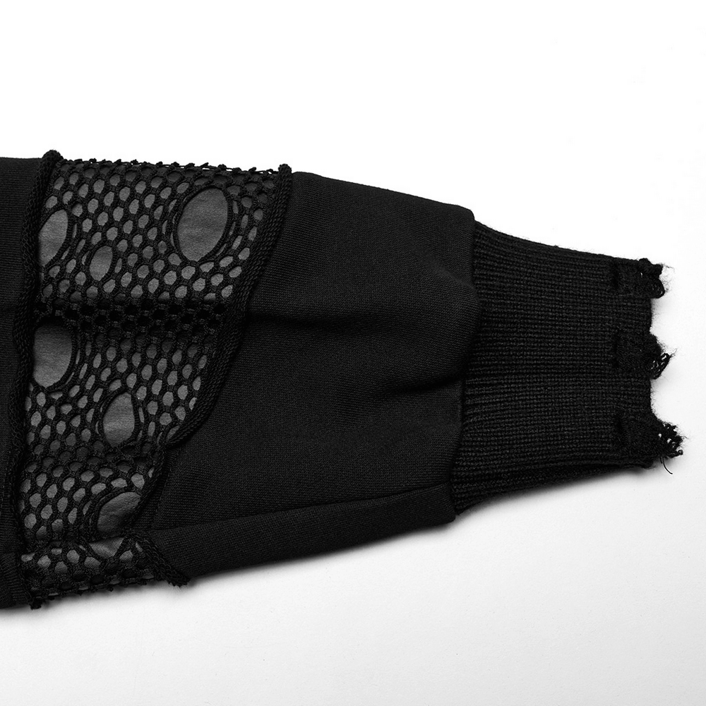 Close-up of black hoodie sleeve with mesh detailing and unique design for a gothic style.