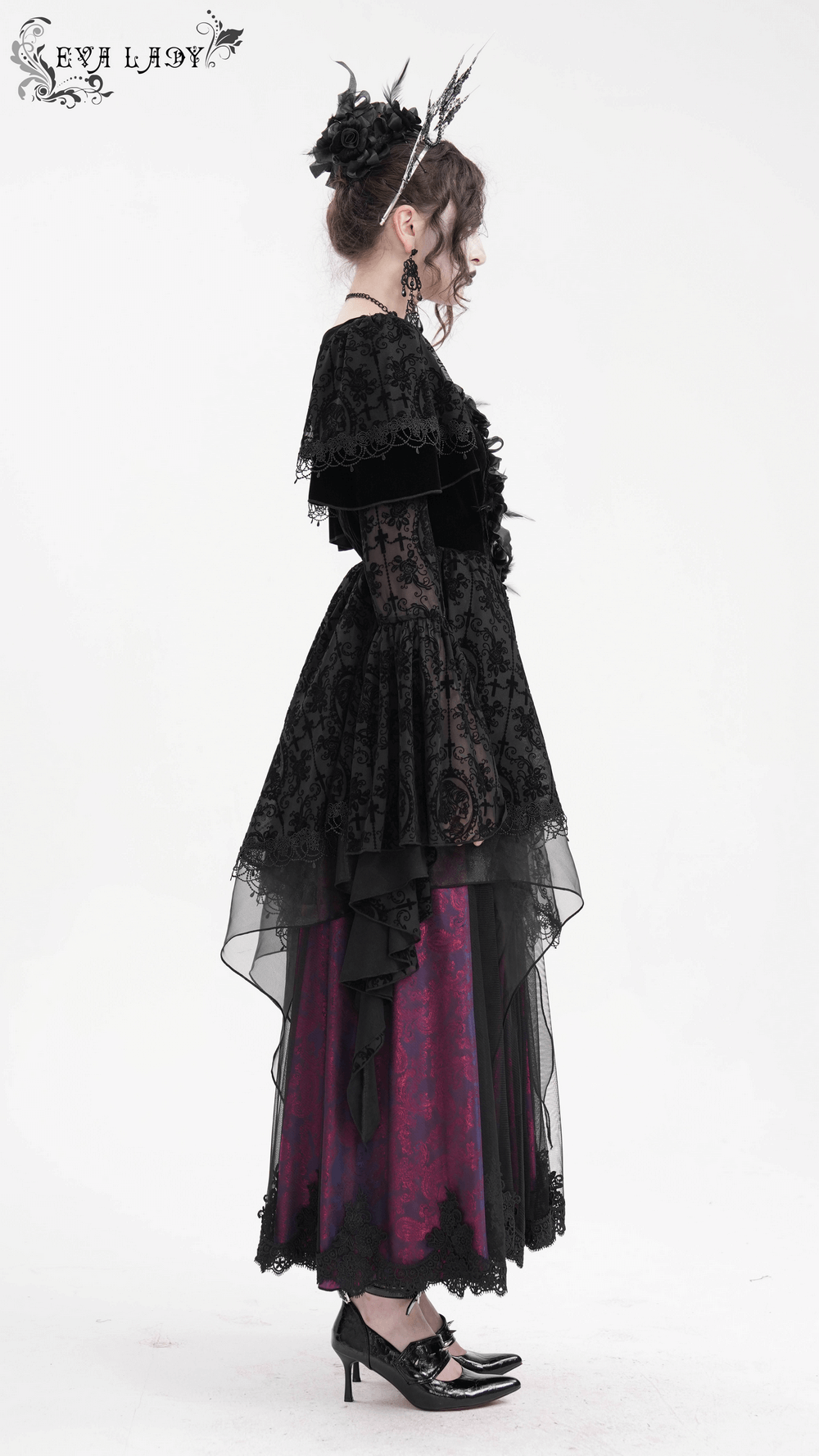 Elegant Gothic Victorian lace dress with ruffled sleeves and layered skirt, showcasing a unique gothic style.