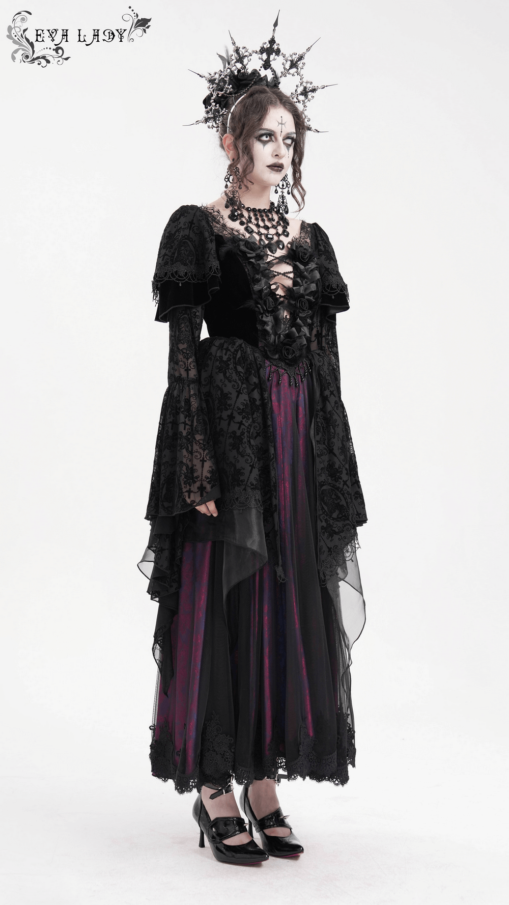 Elegant Gothic Victorian dress with ruffled sleeves and intricate lace details, perfect for dark fashion enthusiasts.