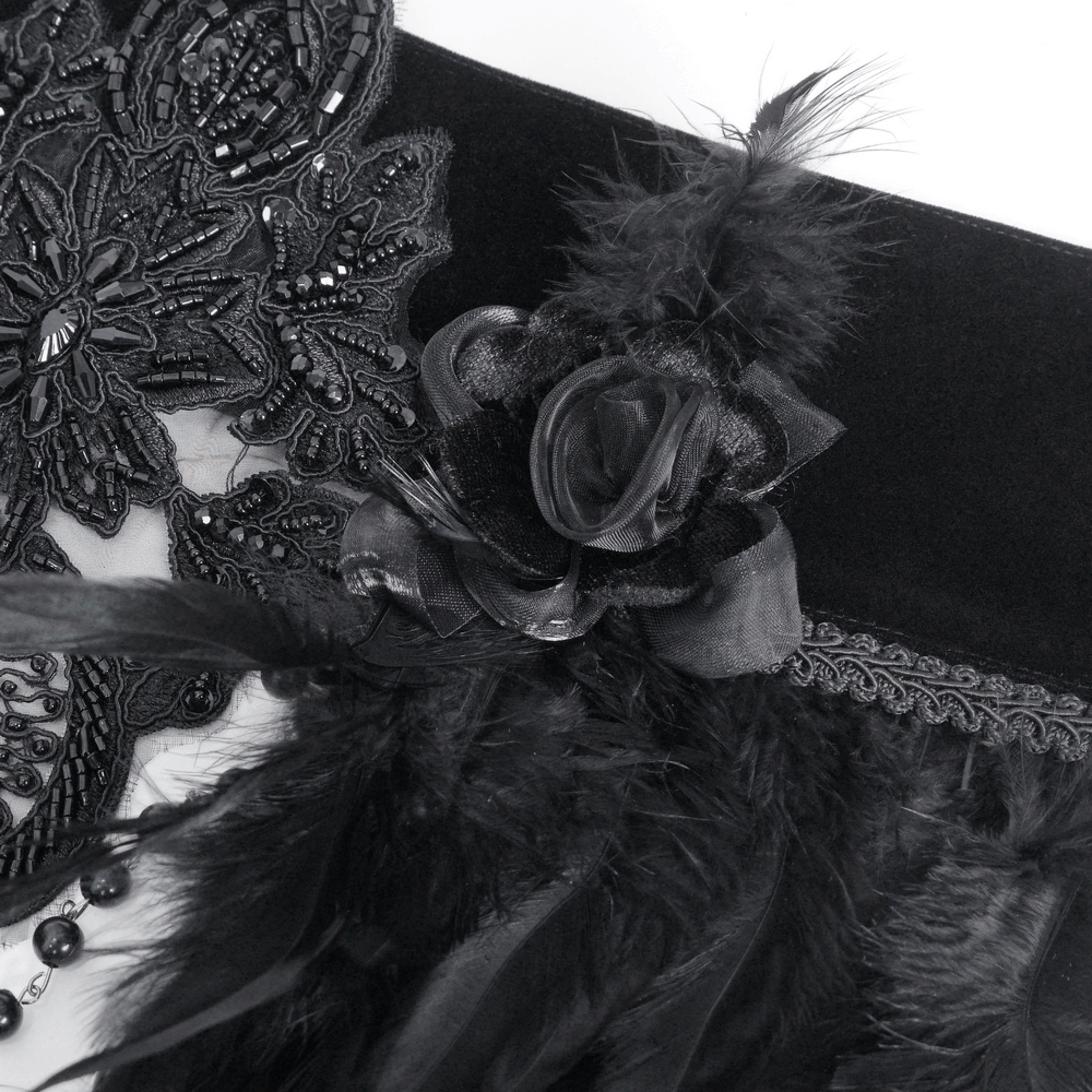 Close-up of a Gothic beaded feather collar with intricate lace and elegant black feathers, perfect for vintage fashion lovers.