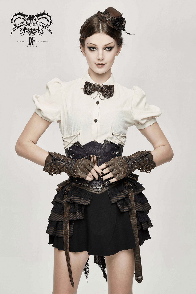 Model showcasing unisex vintage steampunk fingerless gauntlet gloves with a chic dress and stylish accessories.