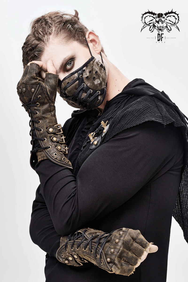 Unisex steampunk fingerless gauntlet gloves in vintage brown with buckled straps and lacing, modeled with a matching mask.