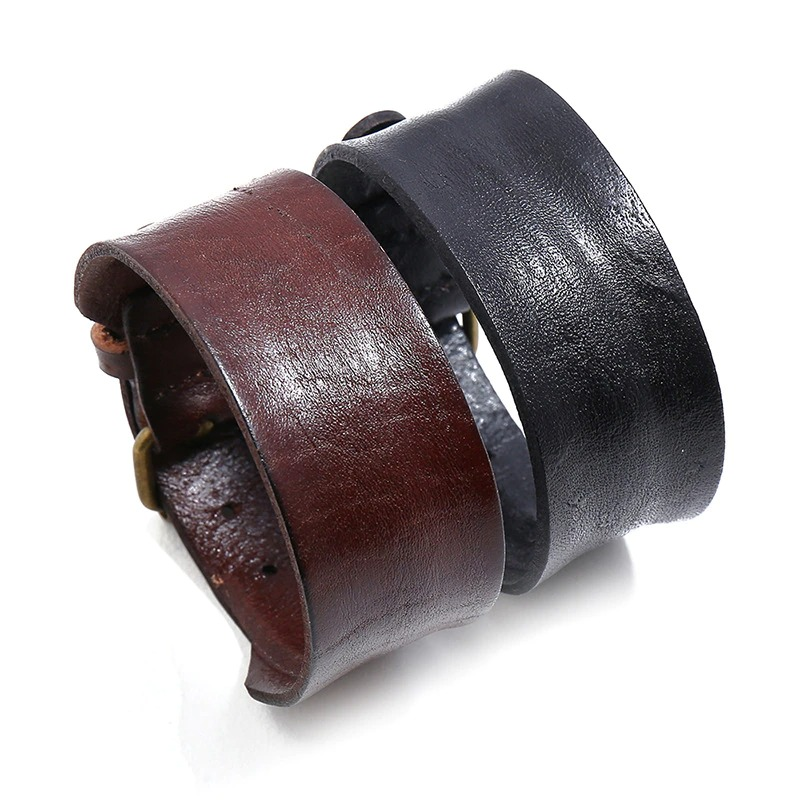 Unisex wide leather bracelets in brown and black colors, showcasing a trendy punk style.