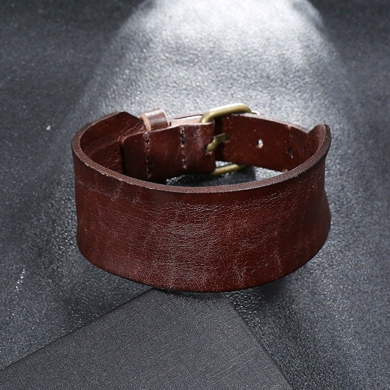 Unisex wide leather bracelet in dark brown, showcasing a sleek design and adjustable buckle, perfect for punk style lovers.