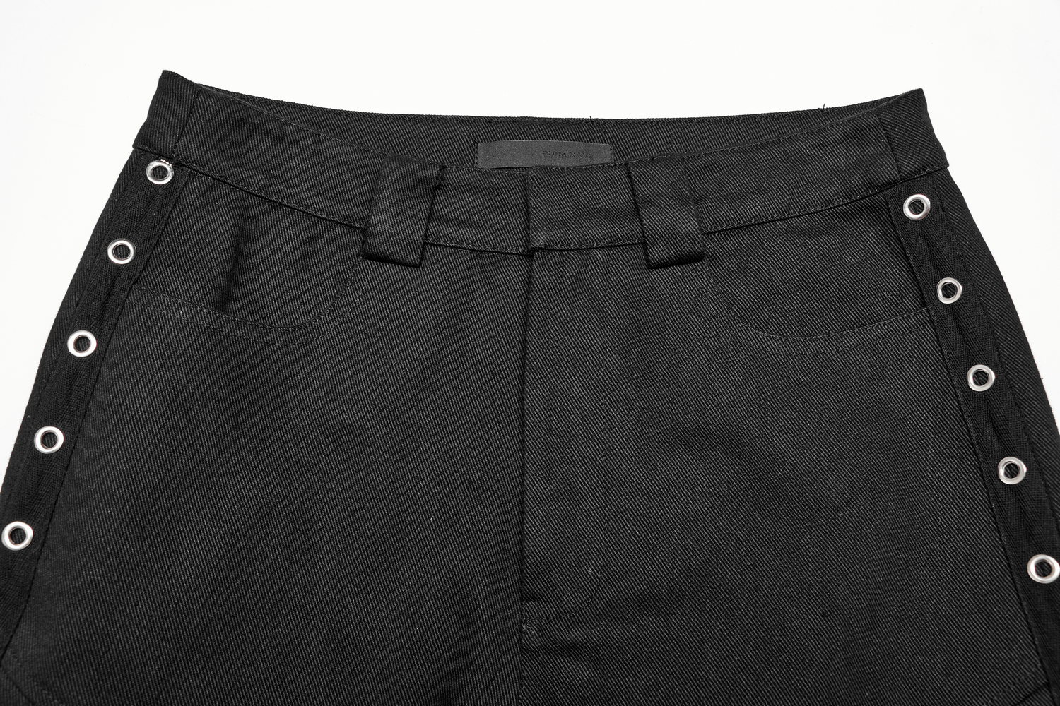 Close-up of Urban Black Medium Waist Cargo Pants with eyelet webbing and pockets.