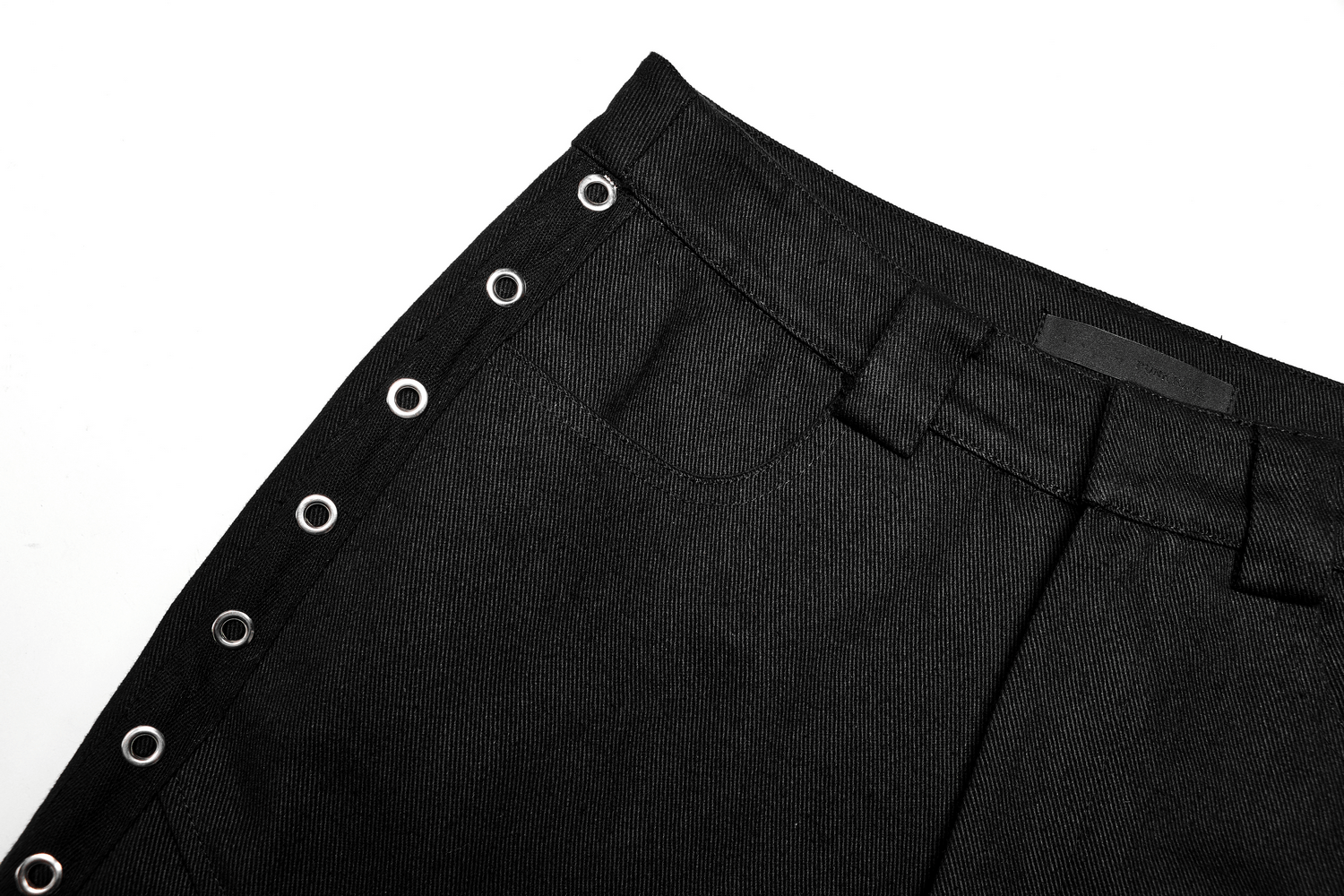 Close-up of Urban Black Medium Waist Cargo Pants with eyelet webbing and metallic zipper accents.