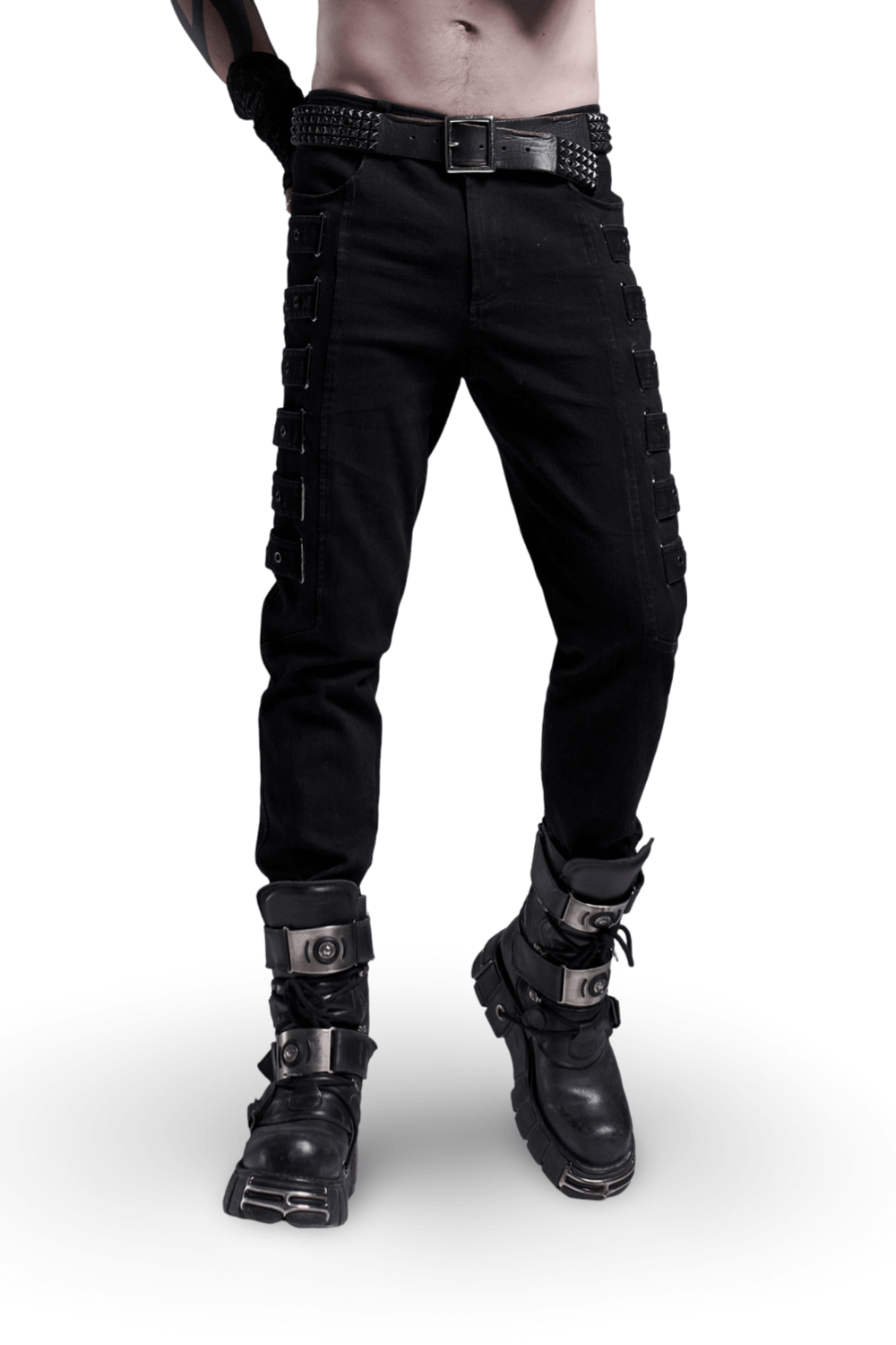 Urban black cargo trousers with strap details and sturdy boots, perfect for an edgy street style look.