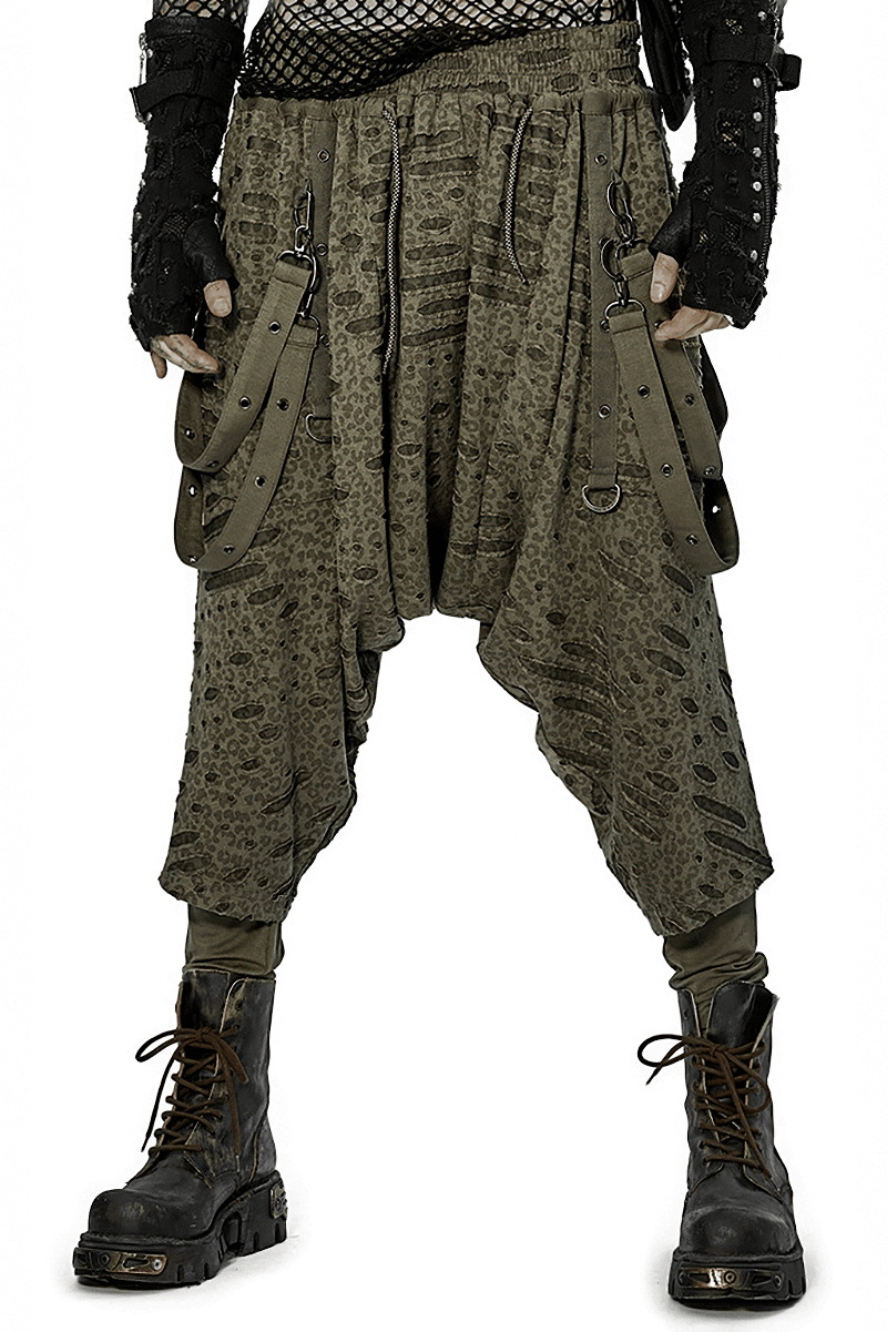 Urban Gothic harem pants in dark green with detachable straps, featuring a loose, avant-garde design for edgy fashion.