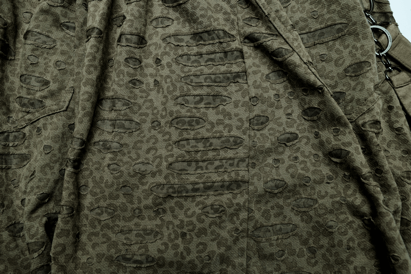 Close-up of textured Urban Gothic Harem Pants featuring unique patterns and detachable straps for edgy fashion.