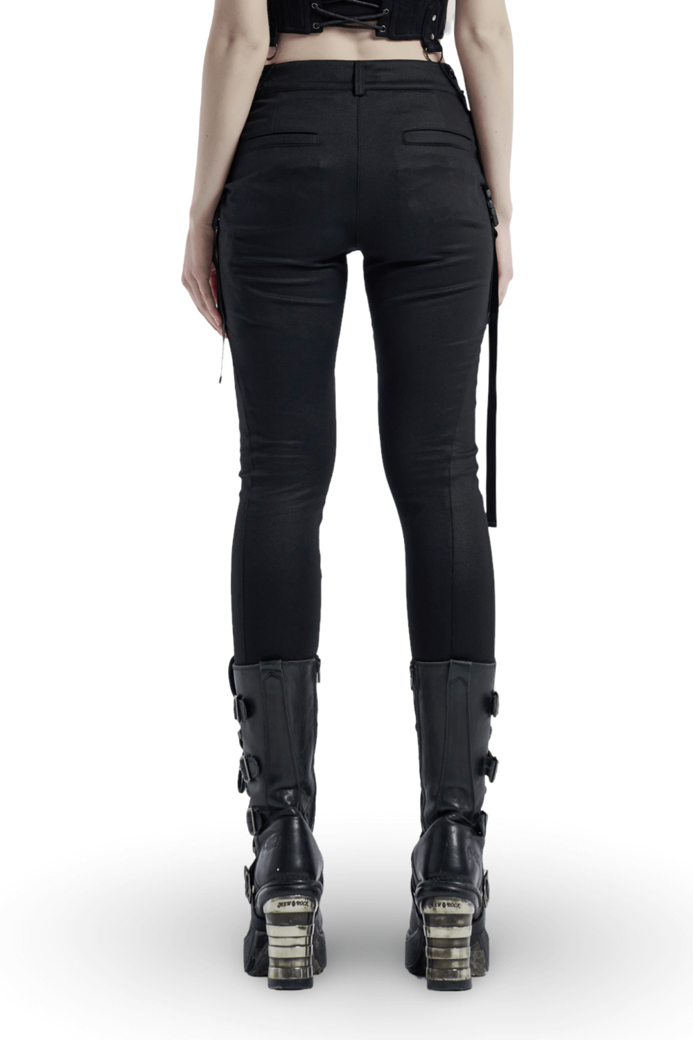 Back view of urban punk black leggings with zip and bandage detail, paired with stylish black boots.