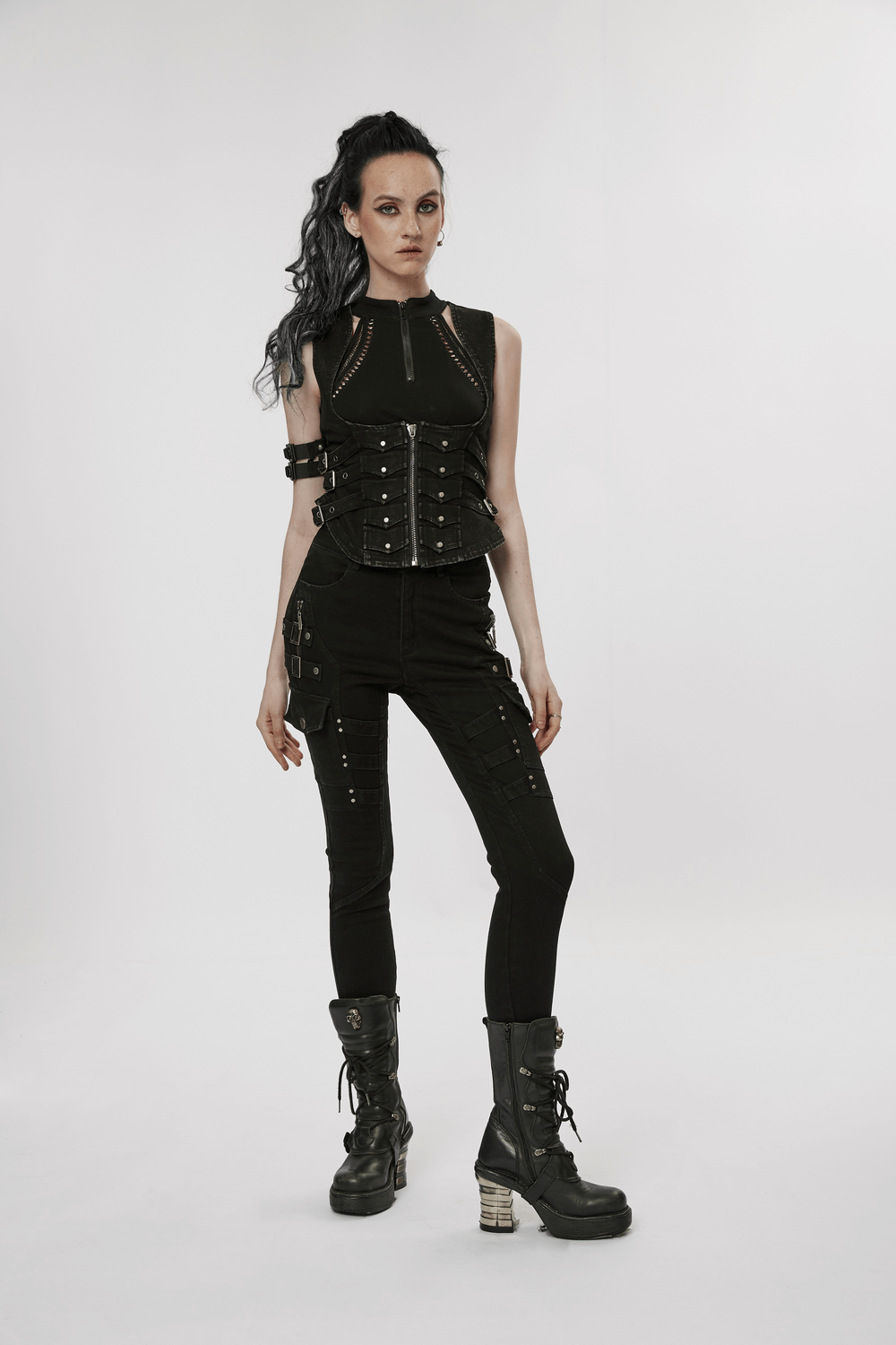 Model wearing Urban Punk Zippered Skinny Jeans with utility loops and a stylish black top, exuding punk urban fashion.