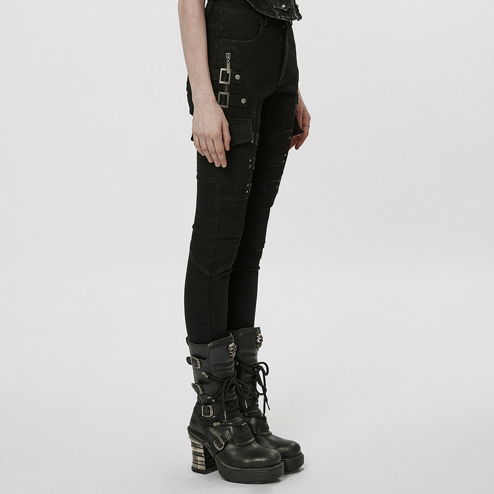 Urban Punk zippered skinny jeans with utility loops, thigh zippers, and edgy black design, paired with stylish combat boots.