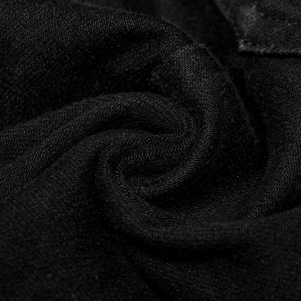 Close-up of soft black fabric, showcasing the stretchy texture ideal for urban punk skinny jeans with zipper detail.