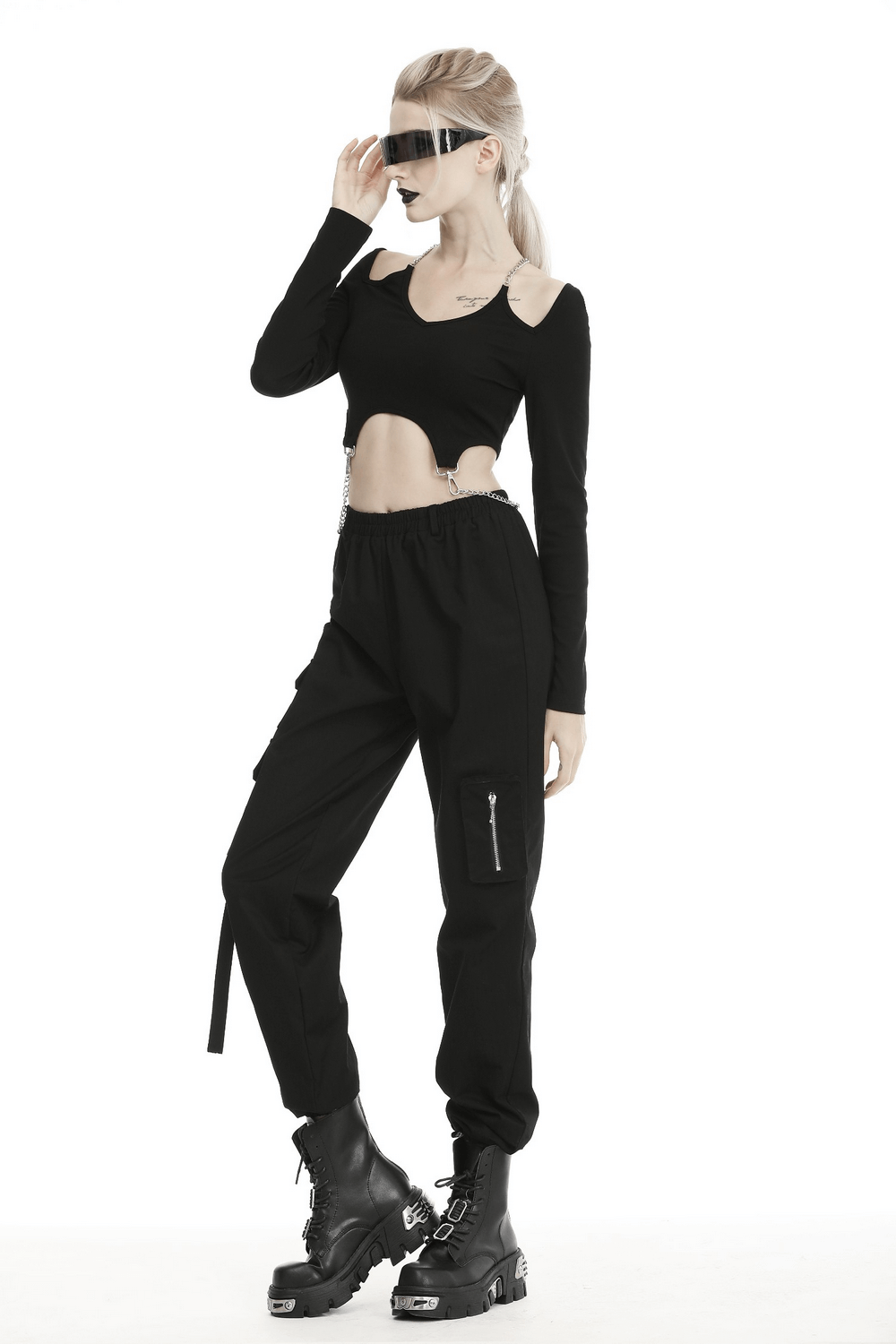 Trendy urban-style black cargo pants with spacious pockets and adjustable drawstrings, paired with a stylish crop top.