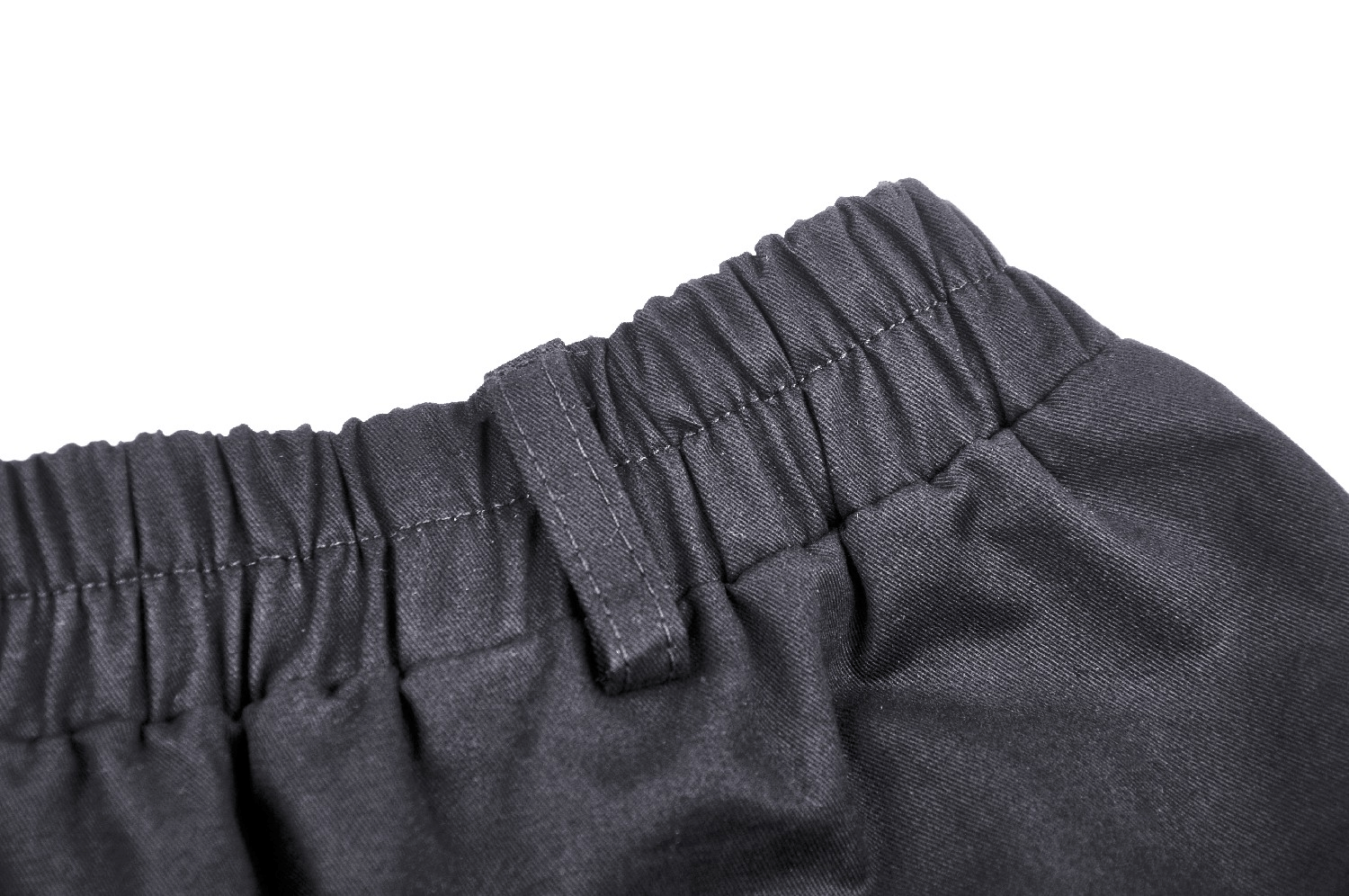 Close-up of adjustable waistband on stylish black cargo pants, highlighting comfort and flexibility.