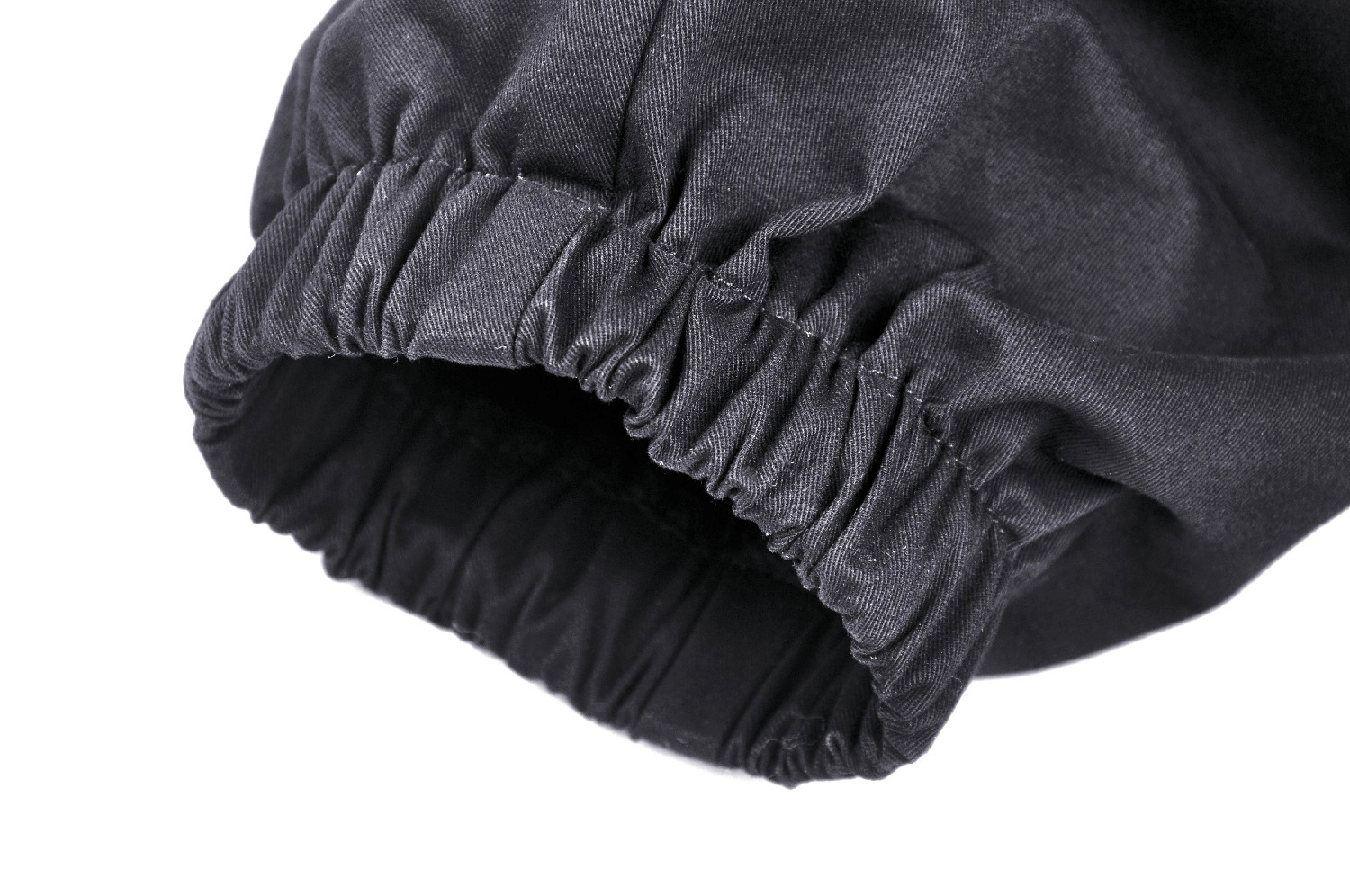 Close-up of adjustable cuff of black cargo pants, showcasing elastic drawstring for a secure fit.