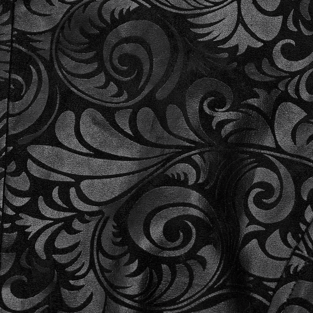 Close-up of embossed Goth printed fabric featuring swirling patterns in black rubberized suede.