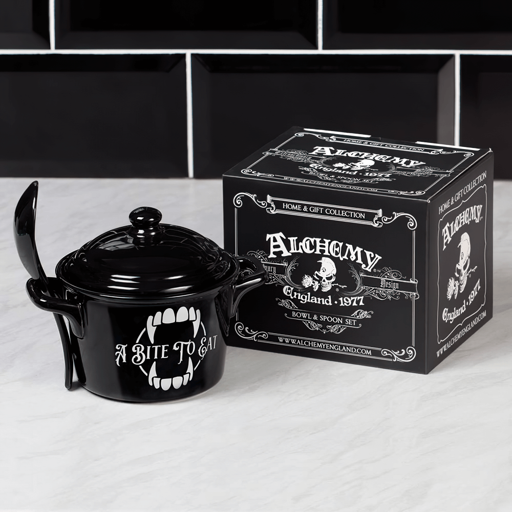 Vampire bite cauldron bowl and spoon set by Alchemy, featuring fang design and stylish packaging for gothic dining.