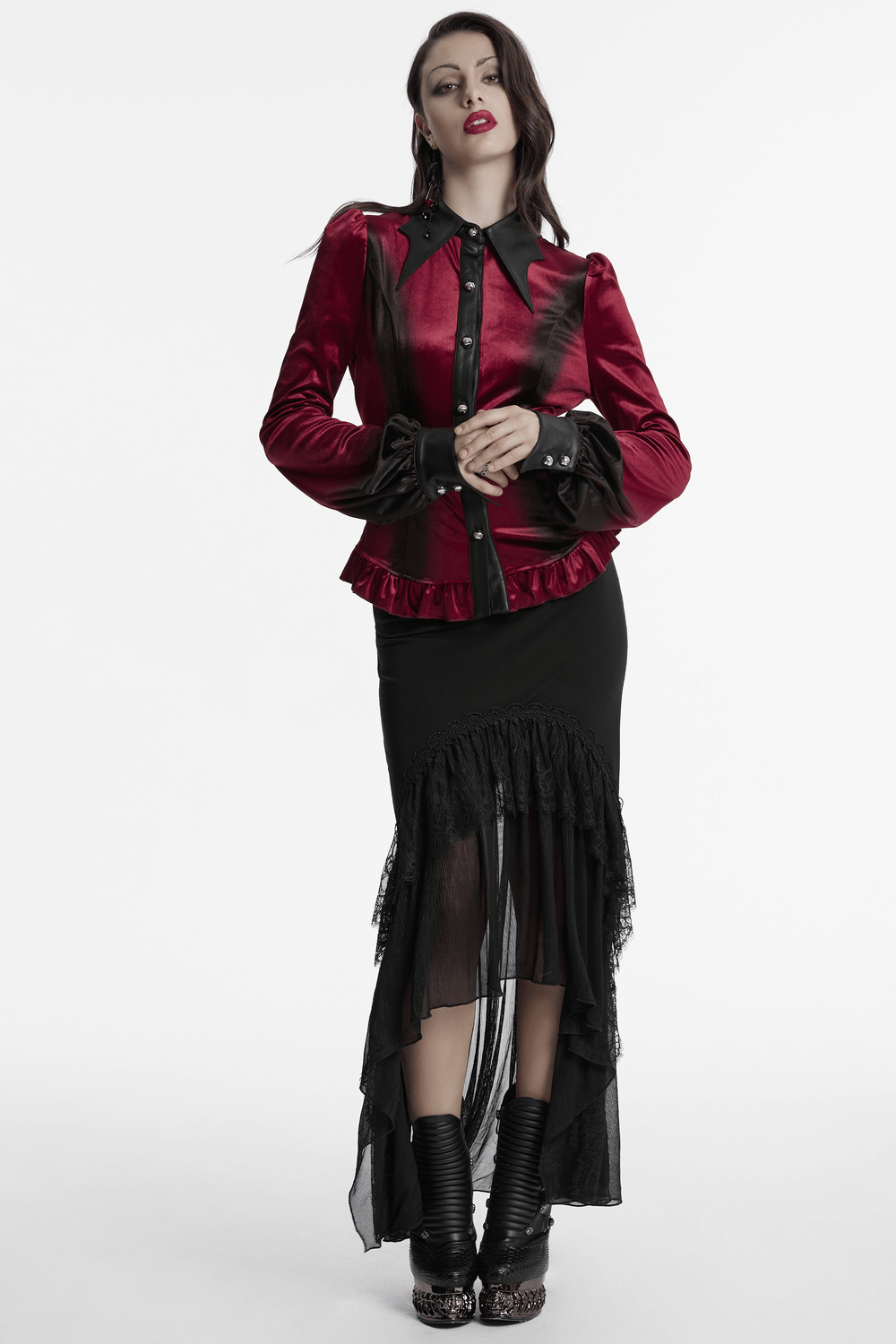 Goth velvet batwing collar shirt in red with lace-up back and ruffle hem, styled with bell sleeves and carved buttons.