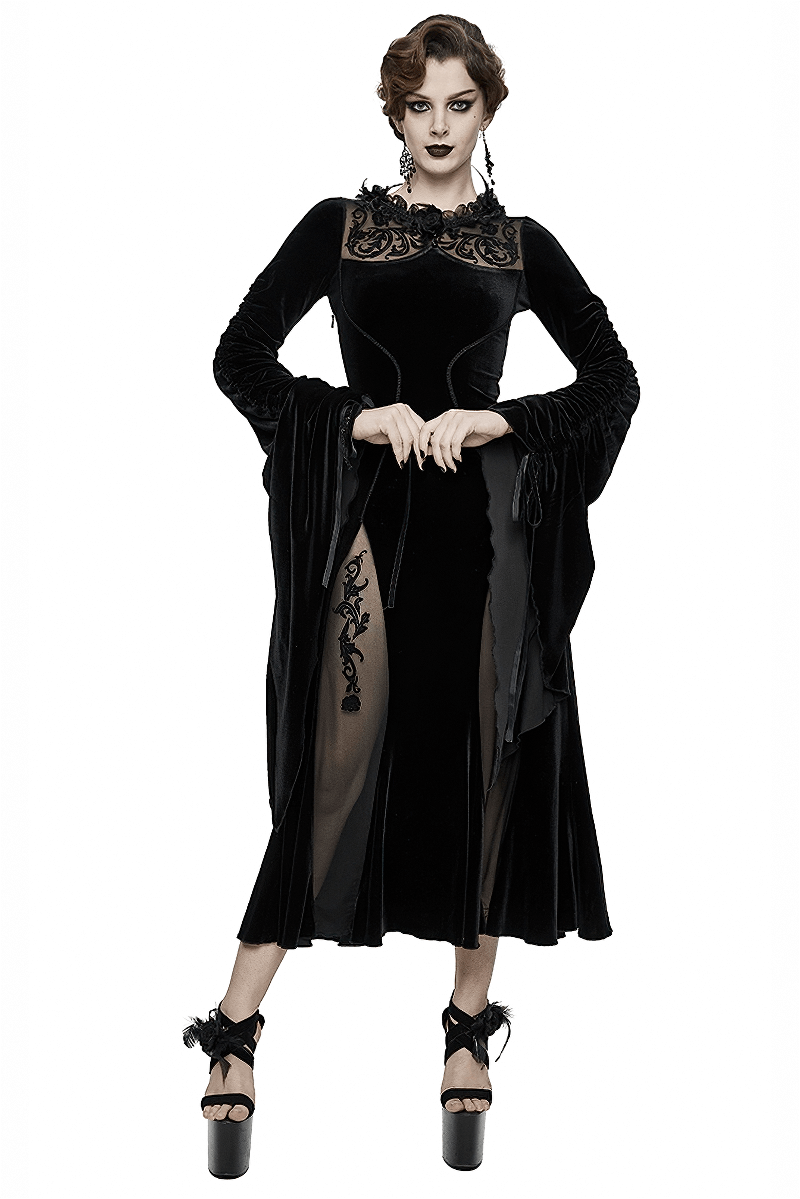 Gothic elegant women's velvet black dress with filigree patterns and wide sleeves for a dramatic look.