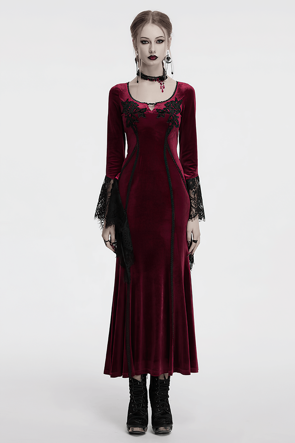 Goth velvet dress with lace bell sleeves and rose embroidery, showcasing a sleek fit and dramatic flair.