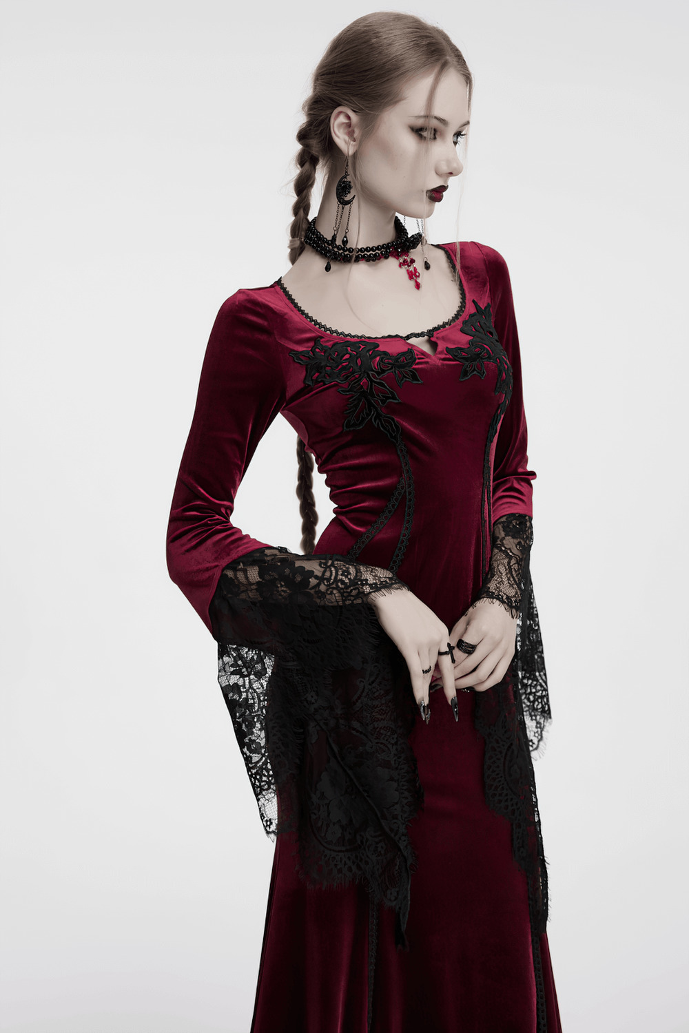 Goth velvet dress with lace bell sleeves and rose embroidery, perfect for dark elegance.