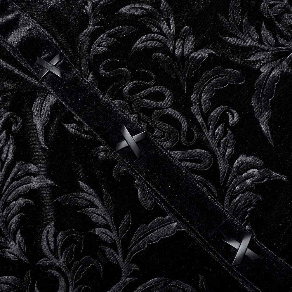 Close-up of velvet embossed gothic shirt showcasing intricate patterns and black snap buttons for a stylish finish.