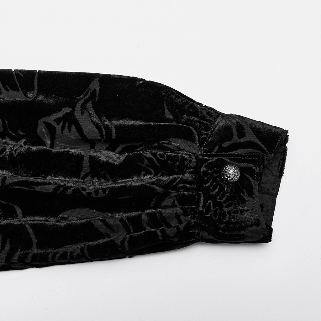 Detail of the Gothic velvet shirt showing the piranha pattern and stylish cuff with mushroom button.