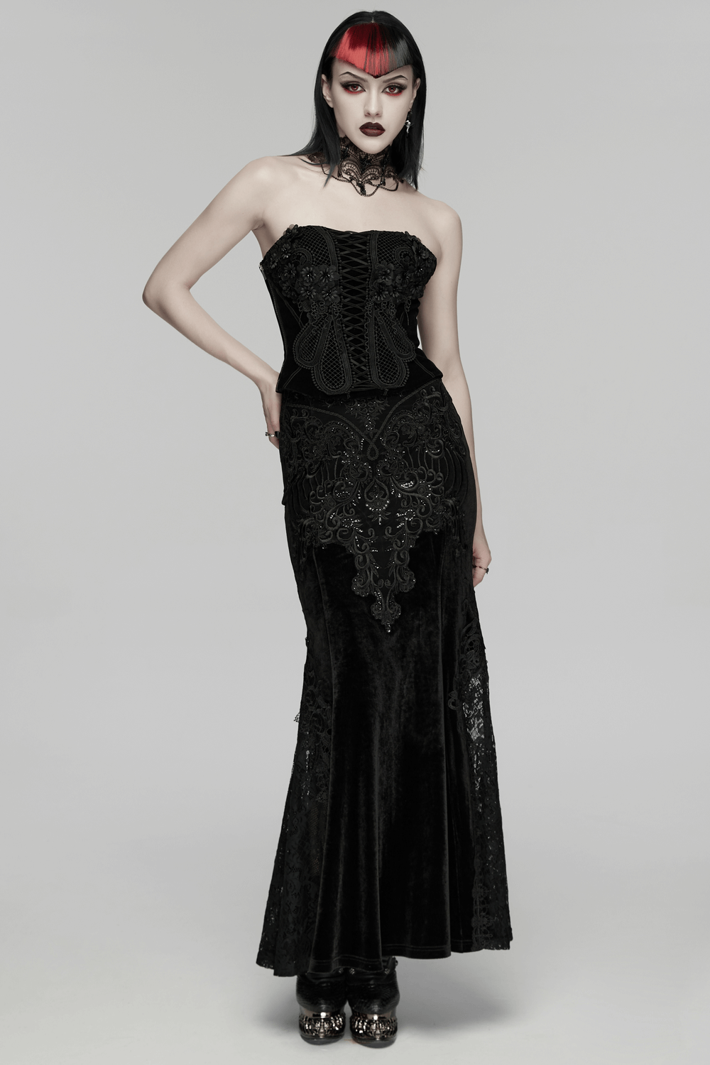 Velvet Goth Skirt with Lace and Sequin Embroidered Detailing showcased by a model in a striking pose.