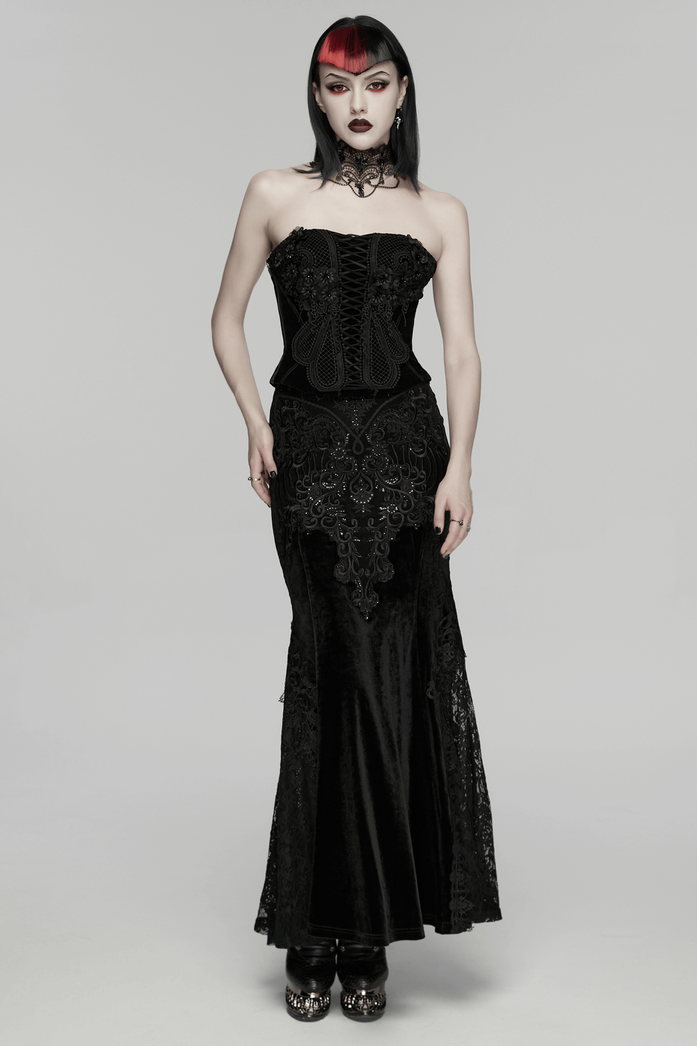 Model wearing a Velvet Goth Skirt with Lace and Sequin Embroidered Detailing, showcasing its elegance and goth style.