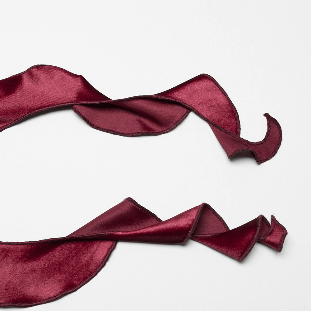 Luxurious burgundy satin ribbon twisted in graceful loops, perfect for adding a touch of elegance to any project.