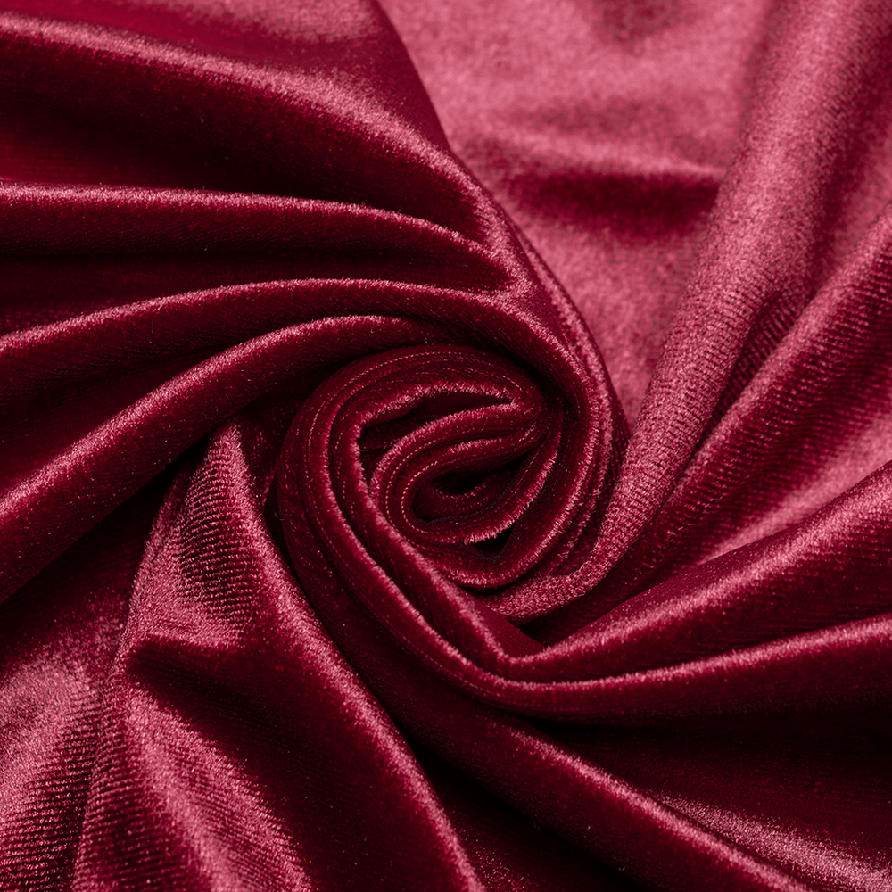 Close-up of rich burgundy velvet fabric, soft and luxurious, perfect for gothic-inspired fashion.