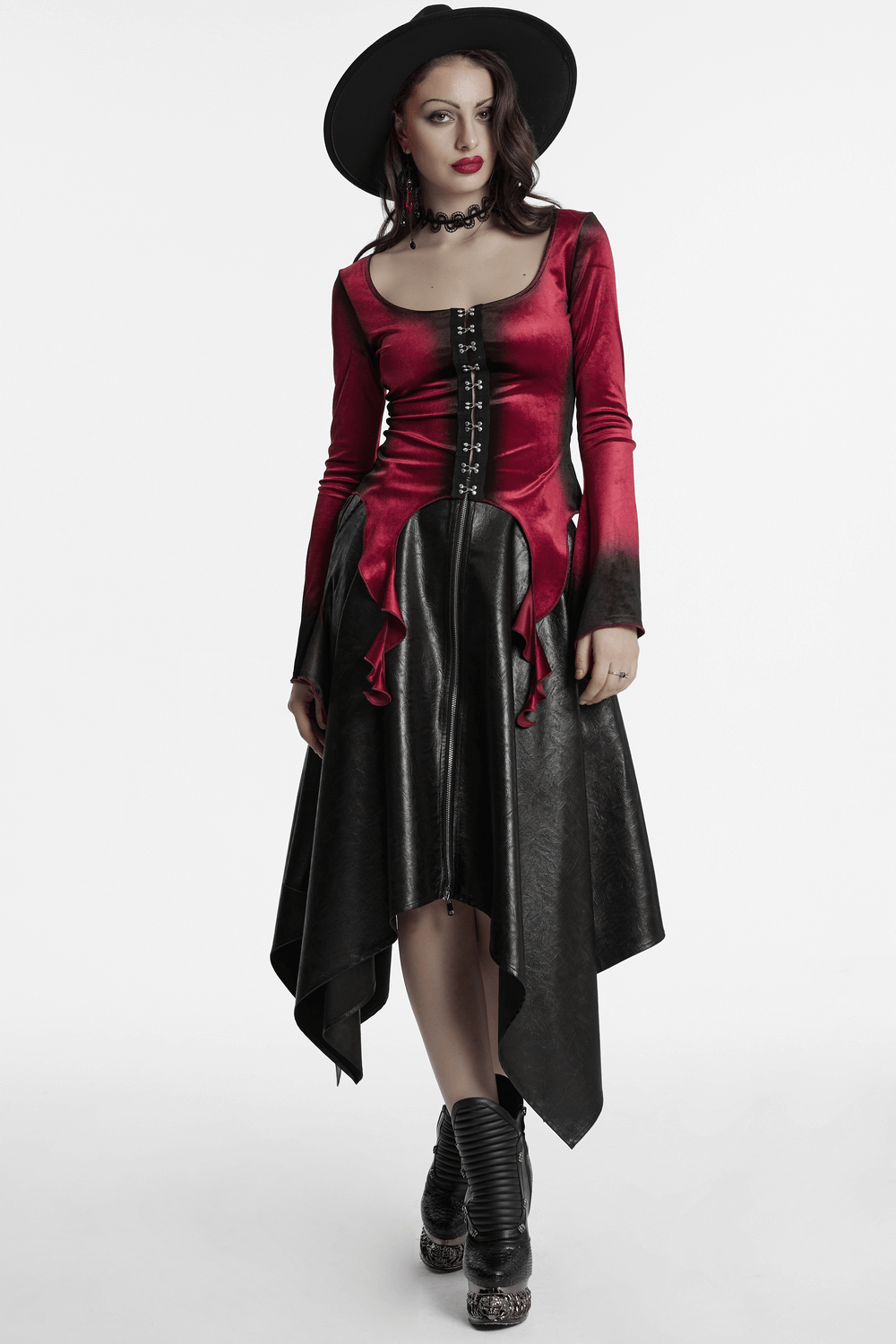 Gothic velvet top with spiral sleeves, buckles, and a flowing black skirt for a stunning alternative fashion look.