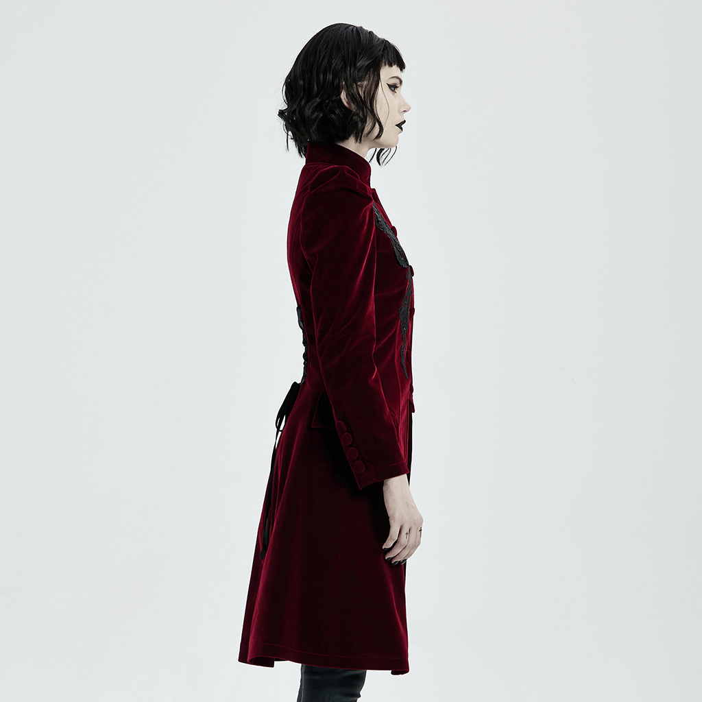 Side view of a red velvet Gothic coat with lace detail and drawstring back, showcasing its Victorian-inspired elegance.
