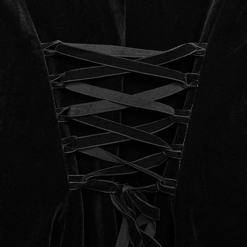 Close-up of luxurious black velvet coat lace-up back design with elegant ribbon detailing.
