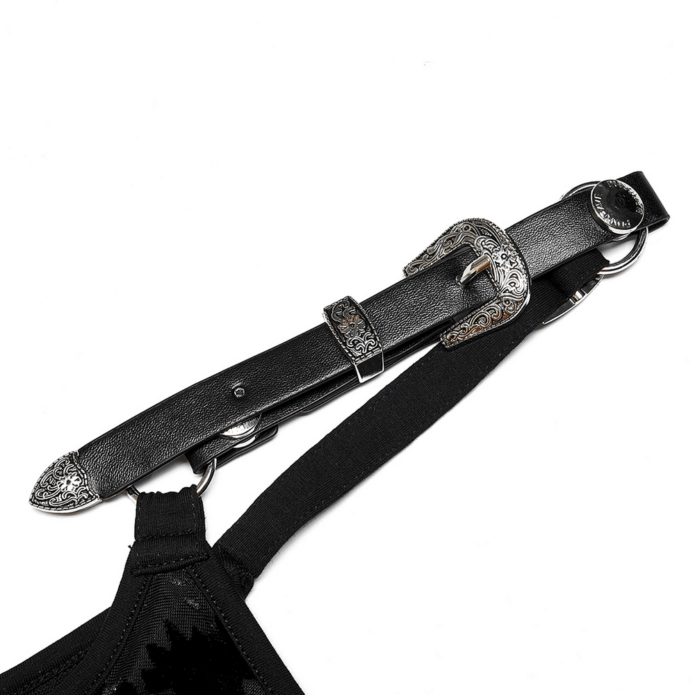 Close-up of a removable leather strap loop with ornate buckle for gothic dress.