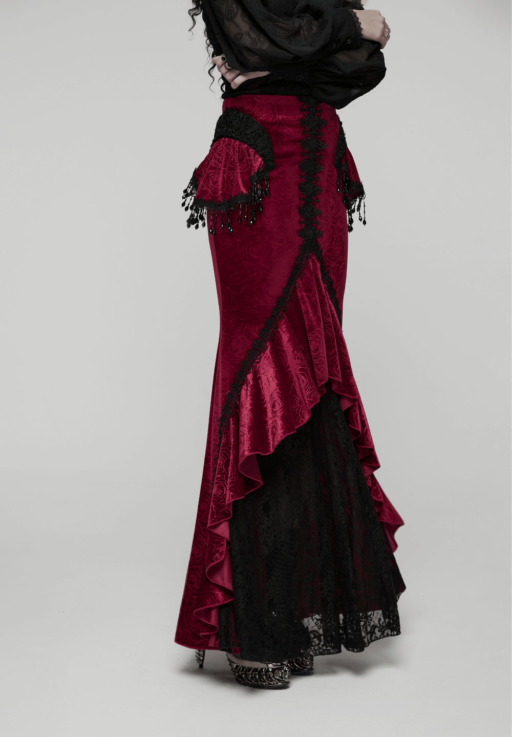 Velvet Gothic Fishtail Skirt with Lace and Tassel Beads showcasing a dramatic silhouette and luxurious tassel details.