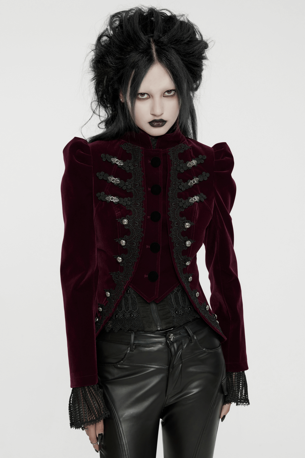 Luxurious velvet gothic jacket with intricate appliques and lace-up back, showcasing vintage elegance and modern flair.