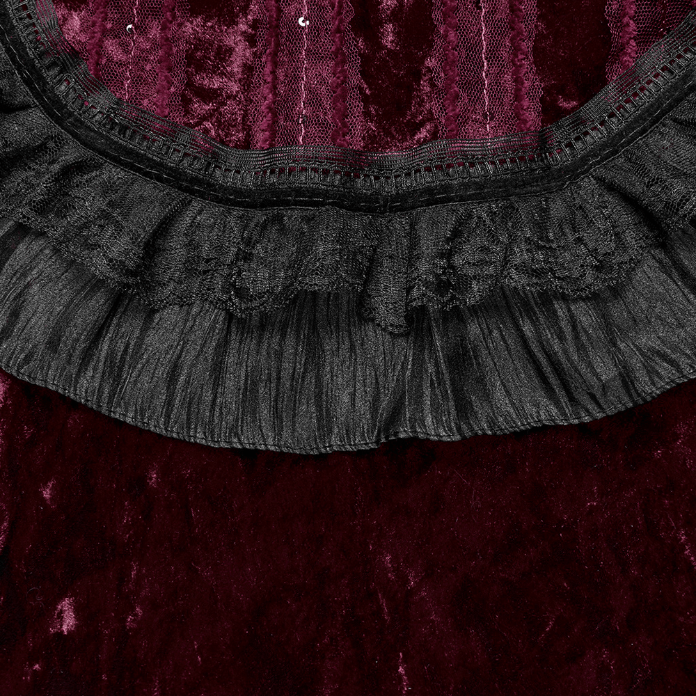 Close-up of velvet gothic cape collar with black lace ruffle and rich burgundy texture, showcasing elegance and detail.